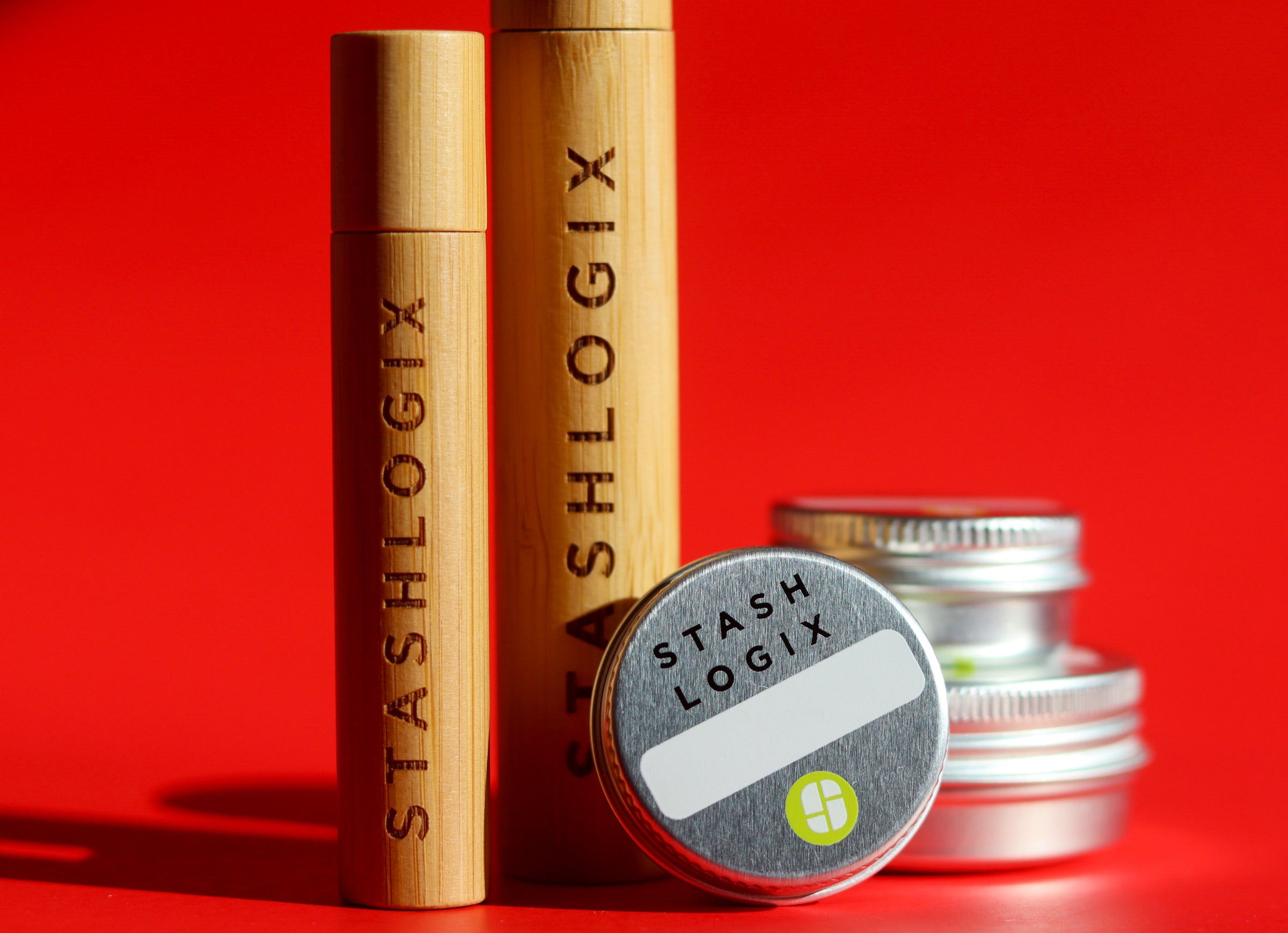Image of stashlogix accessories like smell-proof tubes and storage tins