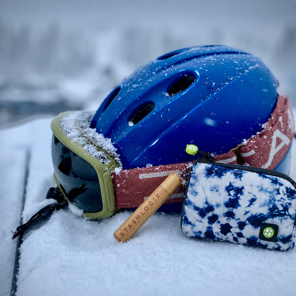 Image of ski helmet with bamboo StashTube and Dotsero in the snow.